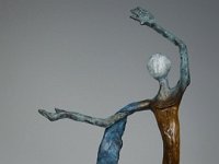 Woodland Dance  Woodland Dance is constructed from three separate tree roots joind by metal rods and sculpted Apoxie mounted on a sandstone base. For me it is a joyous sculpture revelling with exuberance the spirit of existence.  The figure is full of "joie de vivre" as she cavorts and gambols through the woods her mantle dancing in the breeze like a sylvan Isadore Duncan.  33 x 11 x 9 inches   $2475.00